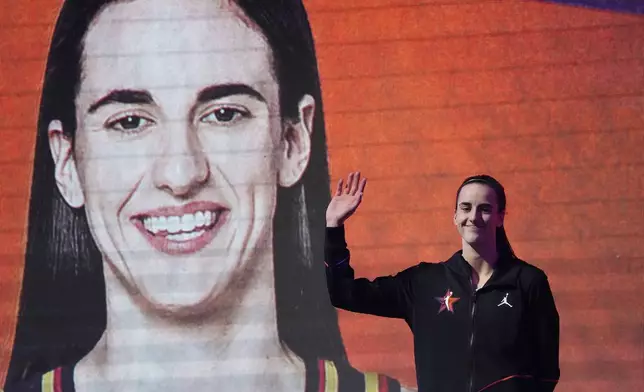 Caitlin Clark, of Team WNBA, is introduced prior to a WNBA All-Star basketball game against Team USA Saturday, July 20, 2024, in Phoenix. (AP Photo/Ross D. Franklin)