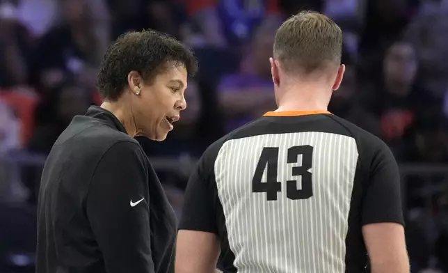 Team WNBA head coach Cheryl Miller, left, argues with referee Kevin Fahy (43) during the second half of a WNBA All-Star basketball game against Team USA, Saturday, July 20, 2024, in Phoenix. (AP Photo/Ross D. Franklin)