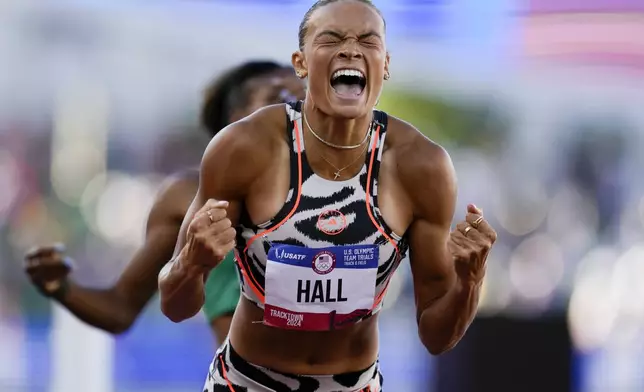 Anna Hall celebrates after winning the women's 800-meter run event and the overall in the heptathlon during the U.S. Track and Field Olympic Team Trials Monday, June 24, 2024, in Eugene, Ore. (AP Photo/George Walker IV)