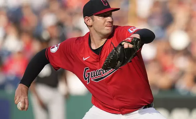 Cleveland Guardians' Gavin Williams pitches in the first inning of a baseball game against the Chicago White Sox, Wednesday, July 3, 2024, in Cleveland. (AP Photo/Sue Ogrocki)