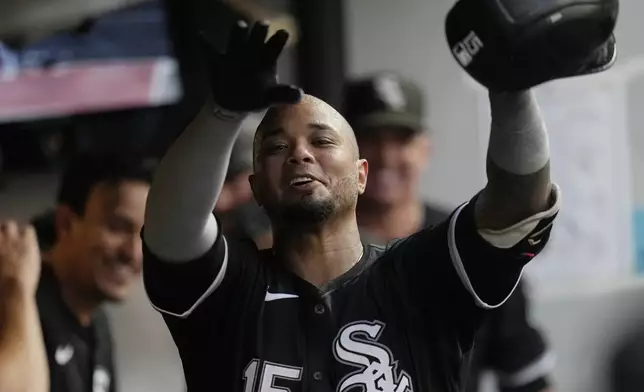 Chicago White Sox's Martin Maldonado celebrates his home run in the eighth inning of a baseball game against the Cleveland Guardians, Wednesday, July 3, 2024, in Cleveland. (AP Photo/Sue Ogrocki)