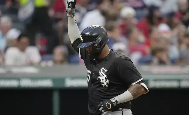 Chicago White Sox's Martin Maldonado celebrates his home run in the eighth inning of a baseball game against the Cleveland Guardians, Wednesday, July 3, 2024, in Cleveland. (AP Photo/Sue Ogrocki)