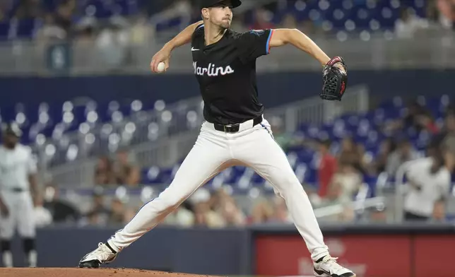 Miami Marlins starting pitcher Bryan Hoeing aims a pitch during the first inning of a baseball game against the Chicago White Sox, Friday, July 5, 2024, in Miami. (AP Photo/Marta Lavandier)