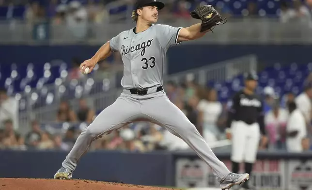 Chicago White Sox starting pitcher Drew Thorpe (33) aims a pitch during the first inning of a baseball game against the Miami Marlins, Friday, July 5, 2024, in Miami. (AP Photo/Marta Lavandier)