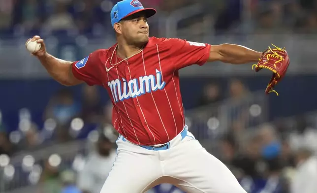 Miami Marlins starting pitcher Yonny Chirinos winds up during the first inning of a baseball game against the Chicago White Sox, Saturday, July 6, 2024, in Miami. (AP Photo/Marta Lavandier)