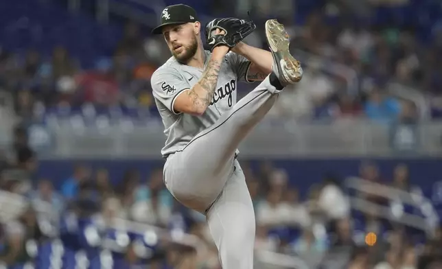 Chicago White Sox pitcher Garrett Crochet winds up during the second inning of a baseball game against the Miami Marlins, Saturday, July 6, 2024, in Miami. (AP Photo/Marta Lavandier)