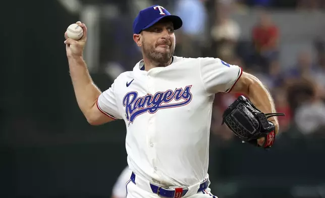 In the first inning of a baseball game Thursday, July 25, 2024, in Arlington, Texas. (AP Photo/Richard W. Rodriguez)