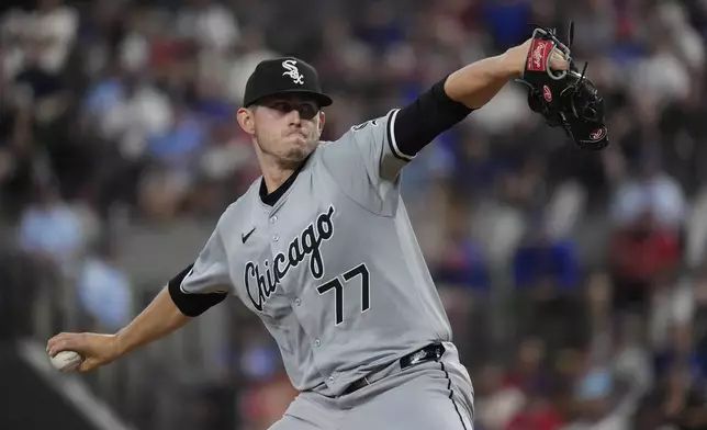 Chicago White Sox starting pitcher Chris Flexen throws during the first inning of a baseball game against the Texas Rangers in Arlington, Texas, Wednesday, July 24, 2024. (AP Photo/LM Otero)