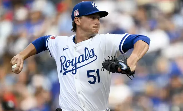 Kansas City Royals starting pitcher Brady Singer throws to a Chicago White Sox batter during the first inning of a baseball game, Saturday, July 20, 2024, in Kansas City, Mo. (AP Photo/Reed Hoffmann)