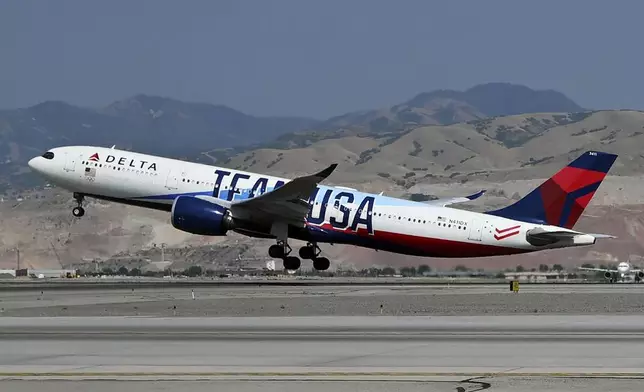 Delta flight 2034 bound for Paris and carrying Utah's Olympic delegation takes off from the Salt Lake International Airport, Monday, July 22, 2024. (Scott G Winterton/The Deseret News via AP)