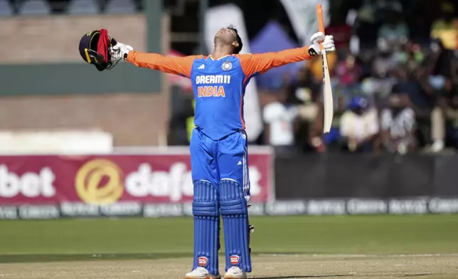 India's batsman Abishek Sharma celebrates after scoring 100 runs during the T20 cricket between Zimbabwe and India at Harare Sports club,Sunday, July 7,2024. (AP Photo/Tsvangirayi Mukwazhi)