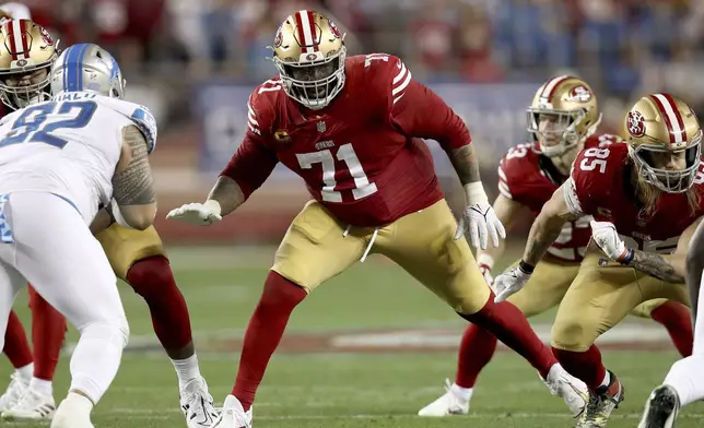 FILE - San Francisco 49ers offensive tackle Trent Williams (71) blocks during the NFC Championship NFL football game against the Detroit Lions in Santa Clara, Calif., Jan. 28, 2024. (AP Photo/Scot Tucker, File)