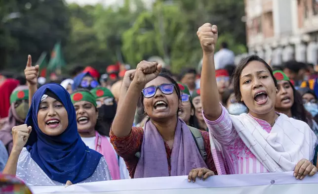 Students shout slogans during a protest demanding the trial of former Prime Minister Sheikh Hasina in Dhaka, Bangladesh, Tuesday, Aug. 13, 2024. (AP Photo/Rajib Dhar)