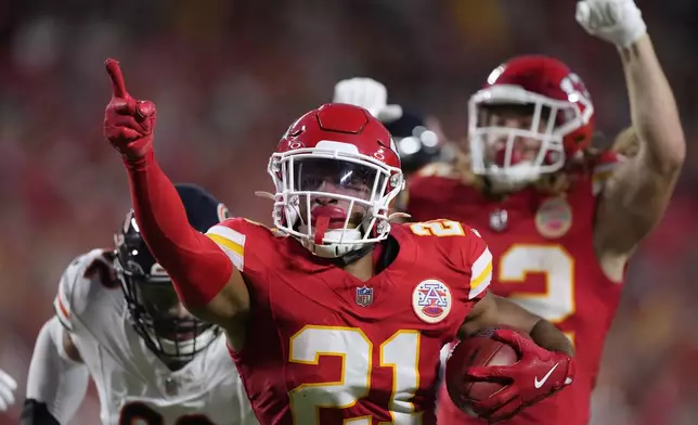 Kansas City Chiefs defensive back Jaden Hicks (21) celebrates after recovering a fumble during the first half of an NFL preseason football game against the Chicago Bears Thursday, Aug. 22, 2024, in Kansas City, Mo. (AP Photo/Charlie Riedel)