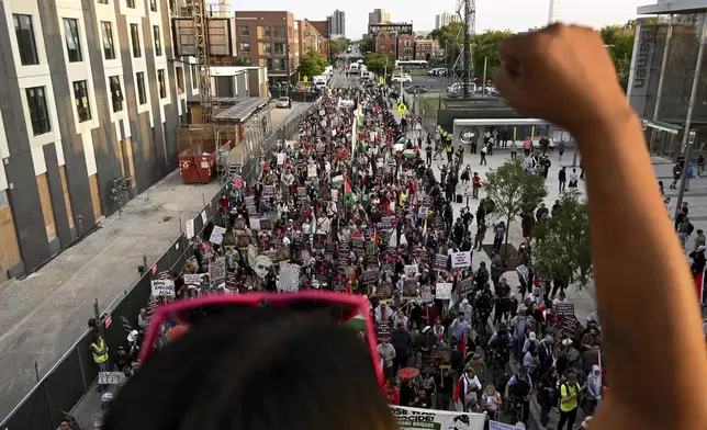 Protesters march during a demonstration outside the Democratic National Convention, Wednesday, Aug. 21, 2024, in Chicago. (AP Photo/Noah Berger)