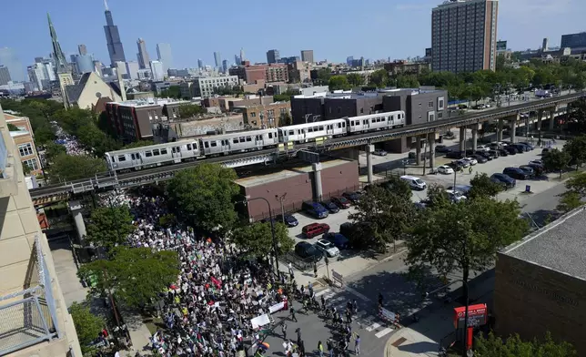 Protesters march to the Democratic National Convention after a rally at Union Park Monday, Aug. 19, 2024, in Chicago. (AP Photo/Julio Cortez)