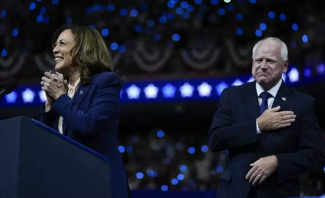 Democratic presidential nominee Vice President Kamala Harris and her running mate Minnesota Gov. Tim Walz speak at a campaign rally in Philadelphia, Tuesday, Aug. 6, 2024. (AP Photo/Matt Rourke)