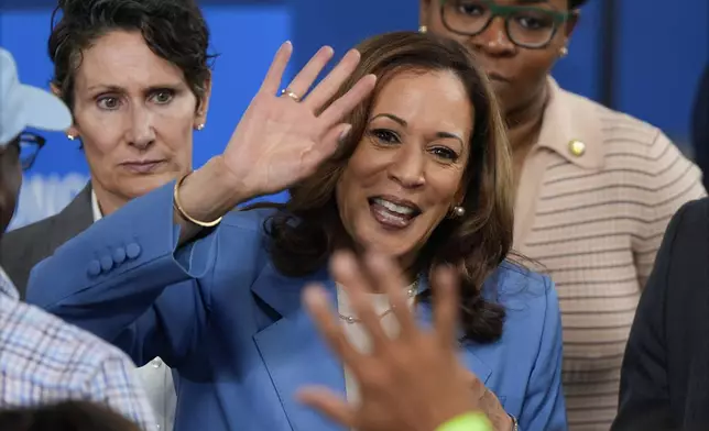 Democratic presidential nominee Vice President Kamala Harris greets supporters at a campaign event at Hendrick Center for Automotive Excellence on the Scott Northern Wake Campus of Wake Tech Community College in Raleigh, N.C., Friday, Aug. 16, 2024. (AP Photo/Mike Stewart)