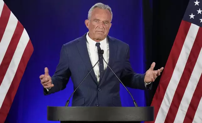 Independent presidential candidate Robert F. Kennedy Jr. announces he is suspending his presidential campaign at a news conference Friday, Aug 23, 2024, in Phoenix. (AP Photo/Darryl Webb)