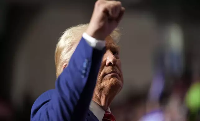 Republican presidential nominee former President Donald Trump gestures after speaking at a campaign event, Friday, Aug. 30, 2024, in Johnstown, Pa. (AP Photo/Alex Brandon)