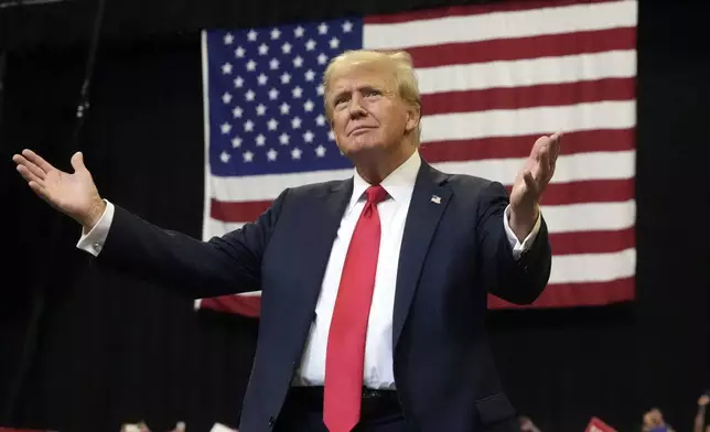 Republican presidential nominee former President Donald Trump arrives to speak at a campaign rally in Bozeman, Mont., Friday, Aug. 9, 2024. (AP Photo/Rick Bowmer)