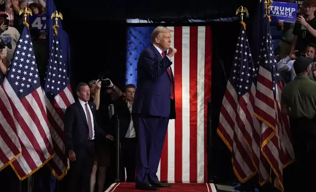 Republican presidential nominee former President Donald Trump arrives to speak at a campaign rally at the Mohegan Sun Arena at Casey Plaza, Saturday, Aug. 17, 2024, in Wilkes-Barre, Pa. (AP Photo/Carolyn Kaster)