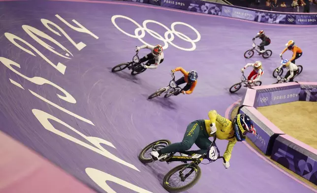 Saya Sakakibara of Australia races to win the gold medal in a BMX racing event, at the 2024 Summer Olympics, Friday, Aug. 2, 2024, in Saint-Quentin-en-Yvelines, France. (AP Photo/Thibault Camus)