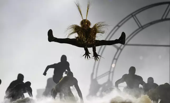 Artists perform during the 2024 Summer Olympics closing ceremony at the Stade de France, Sunday, Aug. 11, 2024, in Saint-Denis, France. (AP Photo/Ashley Landis)