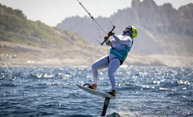 Valentin Bontus, of Austria, screams with joy after winning the gold, during a men's kite final race, Friday, Aug. 9, 2024, during the 2024 Summer Olympics in Marseille, France. (AP Photo/Jacquelyn Martin)