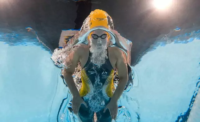 Elizabeth Dekkers, of Australia, competes during a heat in the women's 200-meter butterfly at the 2024 Summer Olympics, Wednesday, July 31, 2024, in Nanterre, France. (AP Photo/David J. Phillip)