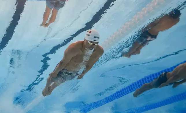 Miguel Alejandro de Lara Ojeda, of Mexico, competes during a heat in the men's 100-meter breaststroke at the 2024 Summer Olympics, Saturday, July 27, 2024, in Nanterre, France. (AP Photo/David J. Phillip)