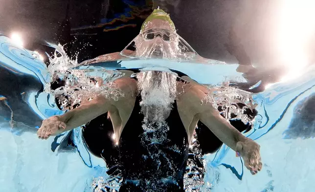 Tatjana Smith, of South Africa, competes during a heat in the women's 200-meter breaststroke at the 2024 Summer Olympics, Wednesday, July 31, 2024, in Nanterre, France. (AP Photo/David J. Phillip)