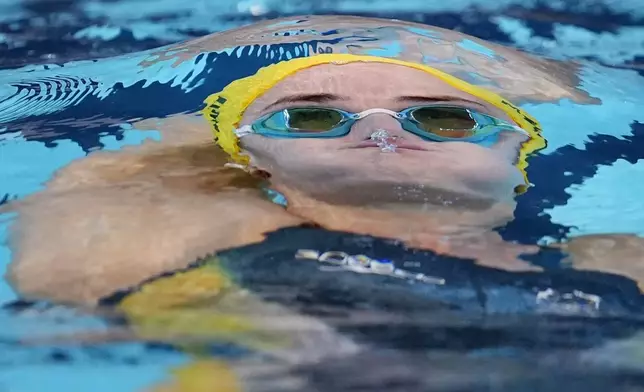 Kaylee McKeown, of Australia, competes in her heat of the women's 200-meter backstroke at the 2024 Summer Olympics, Thursday, Aug. 1, 2024, in Nanterre, France. (AP Photo/Matthias Schrader)