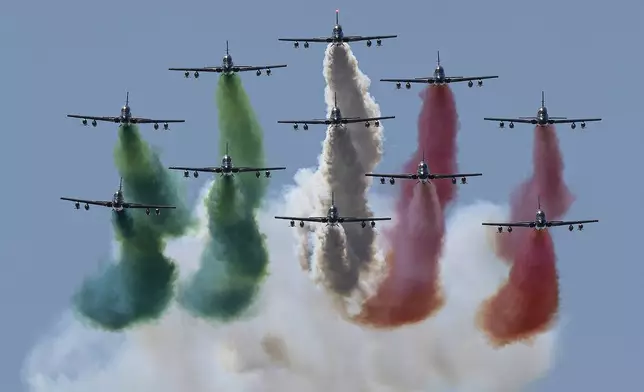 The Italian Air Force Frecce Tricolori performs a flyover the Philadelphia Museum of Art on Monday, Aug 12, 2024. The team is headlining the Air Dot Show in Ocean City, Maryland on August 24-25. (Jose F. Moreno/The Philadelphia Inquirer via AP)