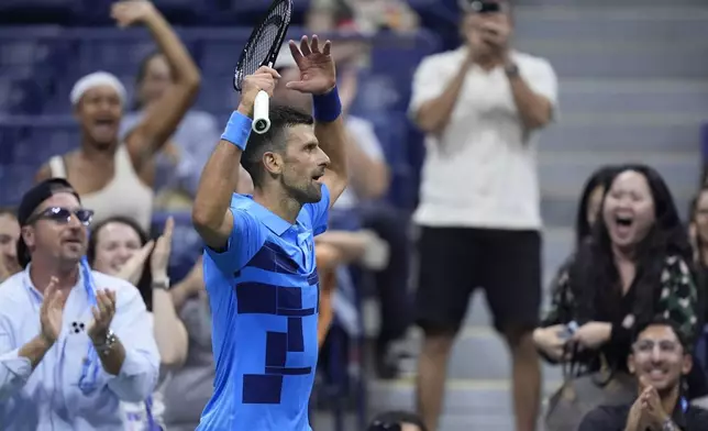 Novak Djokovic, of Serbia, reacts against Radu Albot, of Moldova, during a first round match of the U.S. Open tennis championships, Monday, Aug. 26, 2024, in New York. (AP Photo/Matt Rourke)