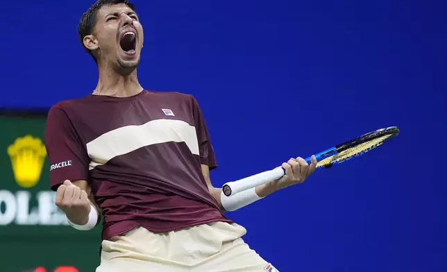 Alexei Popyrin, of Australia, reacts Novak Djokovic, of Serbia,during a third round match of the U.S. Open tennis championships, Friday, Aug. 30, 2024, in New York. (AP Photo/Julia Nikhinson)