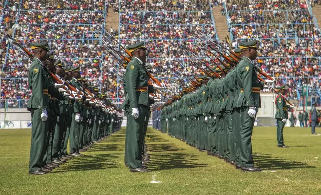 Presidential Guards attend an event marking the 44th Zimbabwe Defense Forces Day at Rufaro Stadium in Harare, Zimbabwe, Tuesday Aug. 13, 2024. (AP Photo/Aaron Ufumeli)