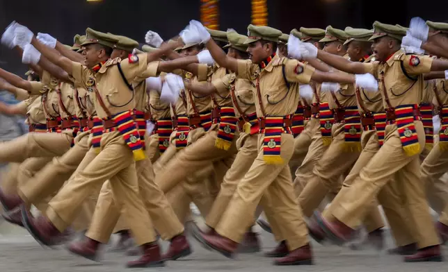 Assam Police personnel take part in a parade during the country's Independence Day celebrations in Guwahati, India, Thursday, Aug. 15, 2024. (AP Photo/Anupam Nath)