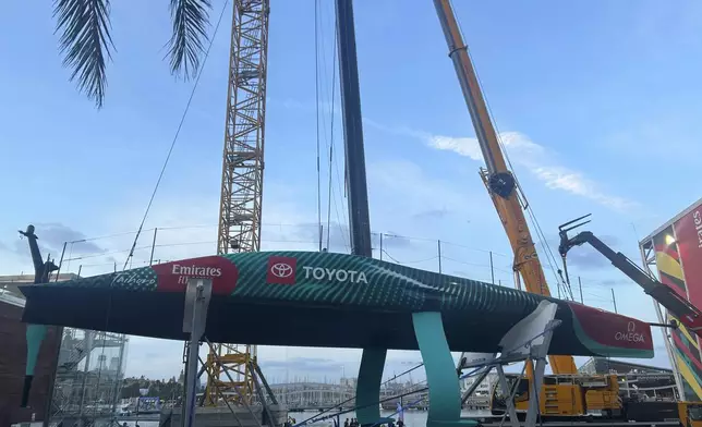 Emirates Team New Zealand’s boat is shown after it was damaged when the crane failed while removing it from the water after racing on the opening day of the 37th America’s Cup in Barcelona, Spain. (AP Photo/Joseph Wilson)