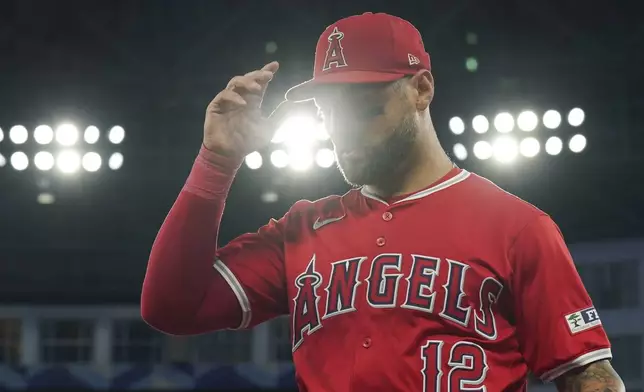 Los Angeles Angels outfielder Kevin Pillar walks back to the dug out at the end of fourth inning during a baseball game against Toronto Blue Jays in Toronto on Friday, Aug. 23, 2024. (Chris Young/The Canadian Press via AP)