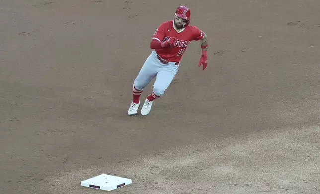 Los Angeles Angels Kevin Pillar rounds the bases to score off an RBI double from Los Angeles Angels Anthony Rendon during second inning of a baseball game in Toronto, Friday, August 23, 2024. (Chris Young/The Canadian Press via AP)