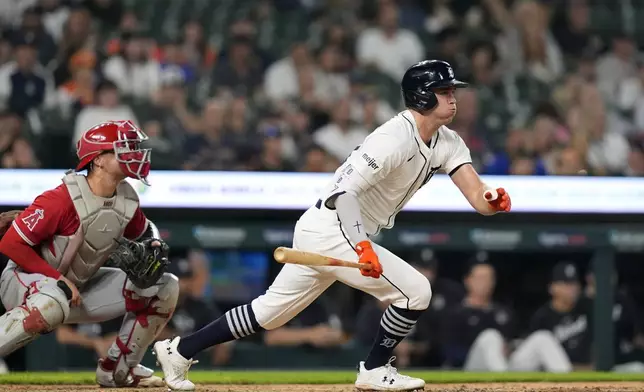 Detroit Tigers' Kerry Carpenter connects for a RBI single to right during the third inning of a baseball game against the Los Angeles Angels, Wednesday, Aug. 28, 2024, in Detroit. (AP Photo/Carlos Osorio)