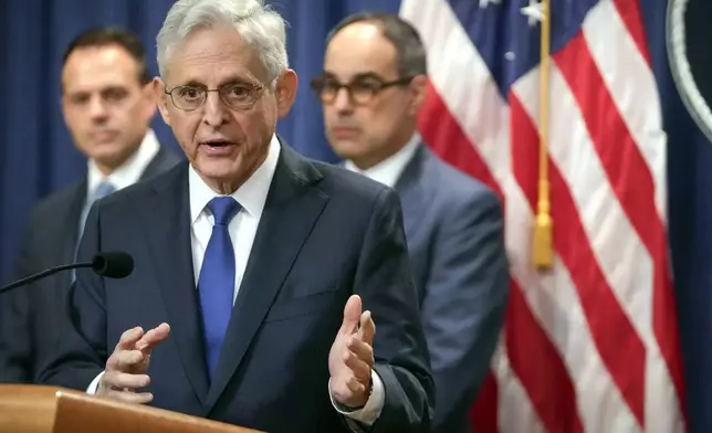 Attorney General Merrick Garland speaks with reporters about an antitrust lawsuit against real estate software company RealPage during a news conference at the Department of Justice, Friday, Aug. 23, 2024, in Washington. (AP Photo/Mark Schiefelbein)