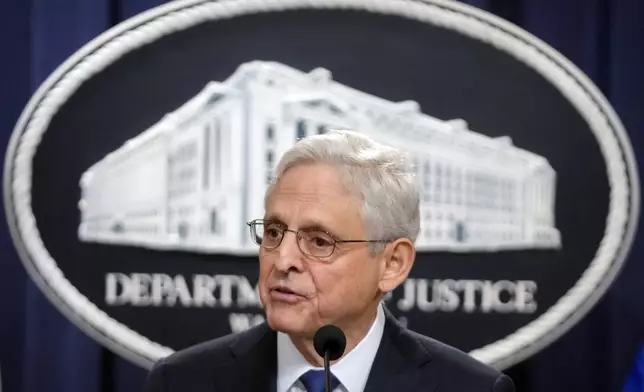 Attorney General Merrick Garland speaks with reporters about an antitrust lawsuit against real estate software company RealPage during a news conference at the Department of Justice, Friday, Aug. 23, 2024, in Washington. (AP Photo/Mark Schiefelbein)