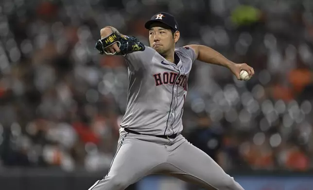 Houston Astros pitcher Yusei Kikuchi throws during the third inning of a baseball game against the Baltimore Orioles, Sunday, Aug. 25, 2024, in Baltimore. (AP Photo/Terrance Williams)