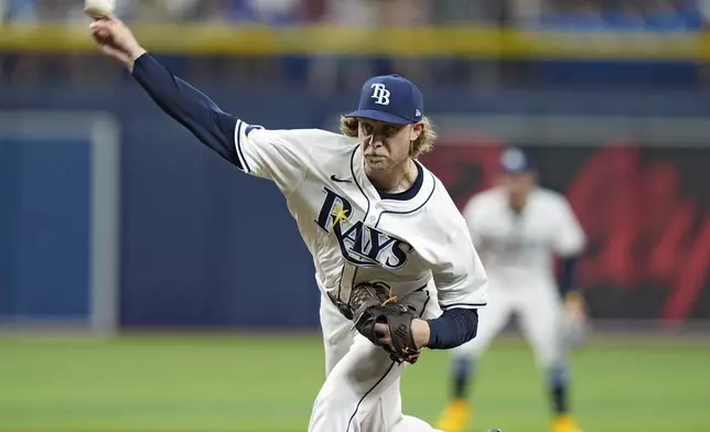 Tampa Bay Rays starting pitcher Shane Baz delivers to the Houston Astros during the first inning of a baseball game Tuesday, Aug. 13, 2024, in St. Petersburg, Fla. (AP Photo/Chris O'Meara)