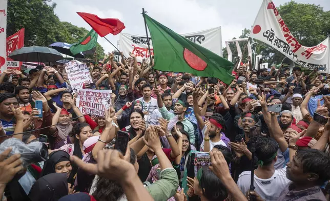 Activists take part in a protest march against Prime Minister Sheikh Hasina and her government to demand justice for more than 200 people killed in last month's violent demonstrations, in Dhaka, Bangladesh, Friday, Aug. 2, 2024. (AP Photo/Rajib Dhar)