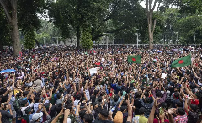 People participate in a protest march against Prime Minister Sheikh Hasina and her government, demanding justice for the victims killed in the recent countrywide deadly clashes, in Dhaka, Bangladesh, Saturday, Aug. 3, 2024. (AP Photo/Rajib Dhar)