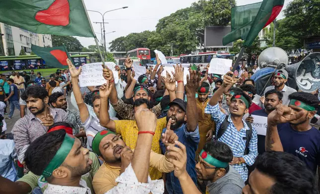 Hindus in Bangladesh hold a rally condemning violence against them and other religious groups in the Muslim-majority country, in Dhaka, Bangladesh, Monday, Aug. 12, 2024. (AP Photo/Rajib Dhar)