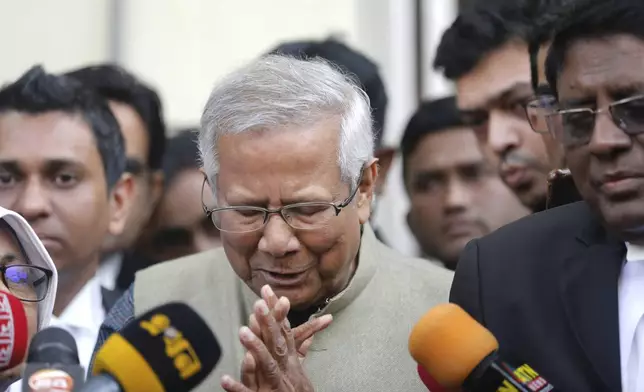 FILE- Nobel Peace Prize laureate Muhammad Yunus gestures after he was granted bail by a labor court in Dhaka, Bangladesh, Sunday, Jan. 28, 2024. (AP Photo/Mahmud Hossain Opu, File)